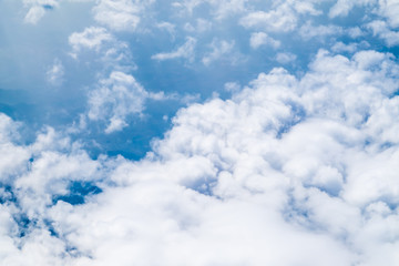 Wall Mural - Aerial view of cloud and sky from airplane,Traveling concept