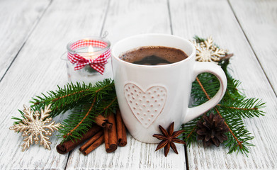 Wall Mural - Cup of coffee and christmas decoration