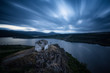 © Emil Rashkovski - Stormy sky over lake and shrine