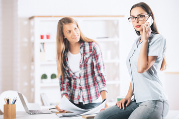 Wall Mural - Women working and talking on phone