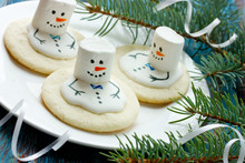 Biscuits With Marshmallow And Icing In The Form Of Snowmen