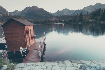 Wall Mural - Matt filtered on instagram style landscape with a lake in the mo