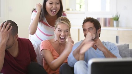 Wall Mural - Friends in front of TV watching game