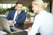 © sepy - Financial advisor with client