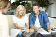 © sepy - Professional businesswoman and her client. Shot of an insurance agent sitting at office with her client and consulting.