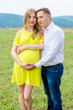 © demchyna - Portrait beautiful couple awaiting baby. Photo shoot at nature