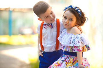 Boy and girl holding hands. Valentine's Day. Love story