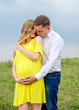 © demchyna - Portrait beautiful young couple waiting for baby. The idea for shooting outdoors pregnancy