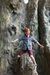 © Prostock-studio - Boy child outdoors climb tree with tiger face painting
