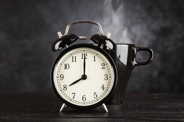 Wall Mural - Alarm clock and a cup of coffee