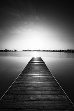 Black And White Photography, Pier At Sunrise In A Park Of Manresa,Catalonia, Spain. Nice Walking Area With Trees And Water Pond
