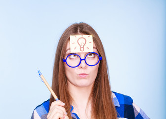 Wall Mural - woman thinking light idea bulb on head