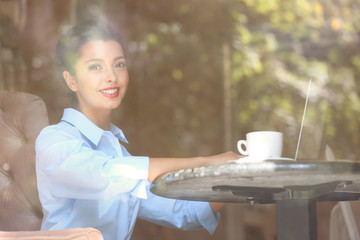 Poster - Beautiful businesswoman working in cafe