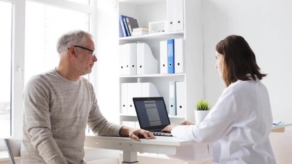 Sticker - senior man and doctor with tablet pc at hospital 67