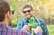 © nikolaborovic88 - Friends Drinking Beer outdoor