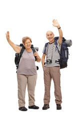 Poster - Two senior hikers waving at the camera