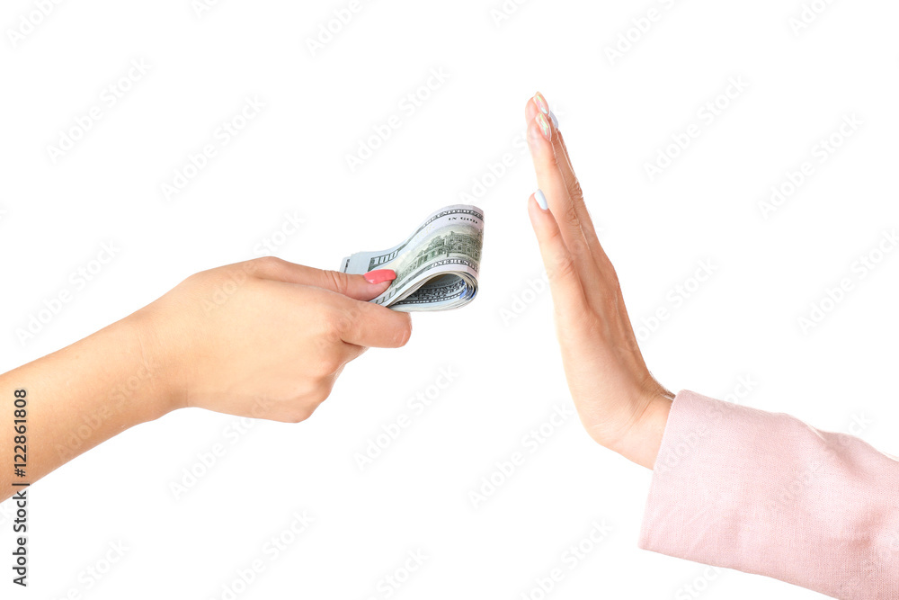 Corruption concept. Female hands with money on white background
