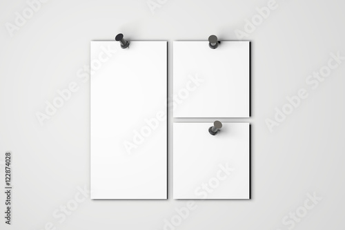 Fotografie, Obraz Blank white poster pinned to a plain wall with pushpins