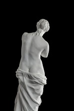 A Statue Of Venus, Plaster Column On A Black Background