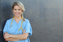 Young Beautiful Successful Female Doctor With Stethoscope - Portrait With Copy Space 