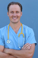 Wall Mural - Martin with stethoscope standing , crossed arms, isolated on blue background