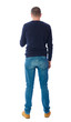 © ghoststone - Back view of man in jeans. Standing young guy. Rear view people collection.  backside view of person.  Isolated over white background.  A guy in a black sweater standing and looking at the phone.