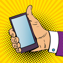 Pop Art Background With Male Hand With Thumb Up Holding A Smartphone With Empty Screen For Your Offer . Vector Colorful Hand Drawn Illustration In Retro Comic Style.