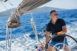 Russian yachtsman during in the race, sailing the Aegean sea.