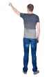 © ghoststone - Back view of  pointing young men in  shirt and jeans. Young guy  gesture. Rear view people collection.  backside view of person.  Isolated over white background.