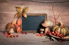 Chalkboard With Space For Your Greeting Text With Autumn Decorat