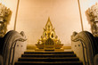 The stair way to golden statue of buddha