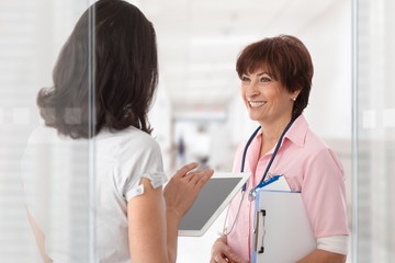 Sticker - Medical crew talking on hospital corridor