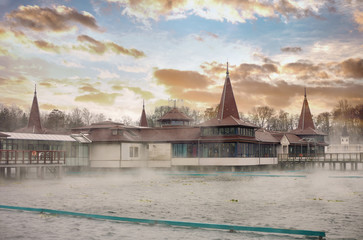 Wall Mural - Heviz lake with a nice cloudscape in Hungary at winter