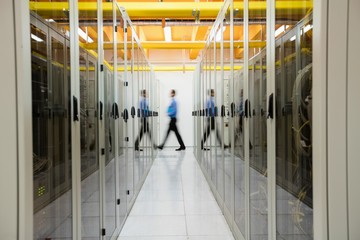 Poster - Technician walking in server room