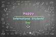 Happy international children's day text message announcement greeting with smiley face and freehand doodle chalk sketchy drawing on grunge black chalkboard background: World children day celebration
