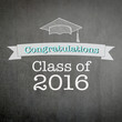 Graduation congratulations class of 2016 text message greeting announcement with freehand doodle chalk sketchy drawing on grunge black chalkboard background: Graduation celebration conceptual idea

