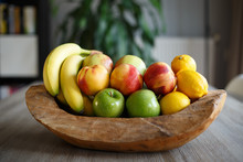 Wooden Bowl Filled With Fresh Fruit