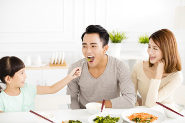 happy young Family enjoy their dinner