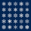 © nadiinko - Cute snowflake collection isolated on blue background. Flat snow icons, snow flakes silhouette. Nice snowflakes for christmas banner, cards. New year snowflake. Organic and geometric snowflakes set.