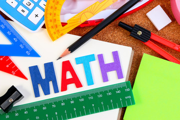 Wall Mural - School math office supplies. Wood letters as Math word with mathematics drawing icon. Math concept.