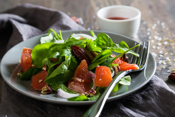 Wall Mural - Fresh salad with salmon and grapefruit