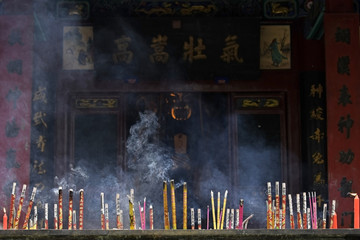 incense with smoke in incense burner. at guan yu shrine-china