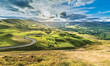 Serpentine Road Among Green Hills of Peak District National Park