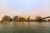 Fototapeta  - New York skyline from Brooklyn Bridge Park at sunset