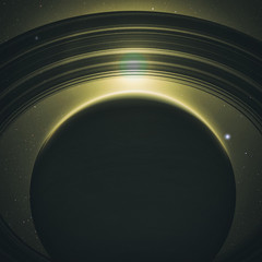 Wall Mural - planet saturn with rings at sunrise on the space background