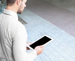 Canvas Print - Lawyer  holding tablet on the street