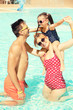 © Africa Studio - Happy family in swimming pool at water park