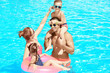 © Africa Studio - Happy family in swimming pool at water park