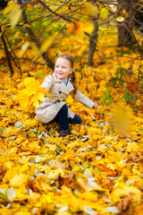 Poster - Little girl outdoors on autumn day