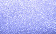 Light blue sparkle glittering abstract background.  Colorful shine and twinkle backdrop